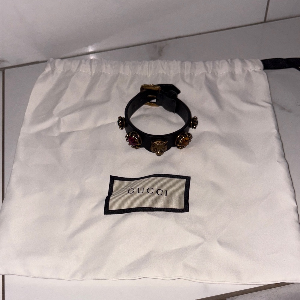 Gucci Black and Gold Bracelet with jeweled accents